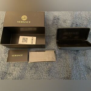 Versace boxes and clothes for sunglasses, black, doesn’t include the glasses